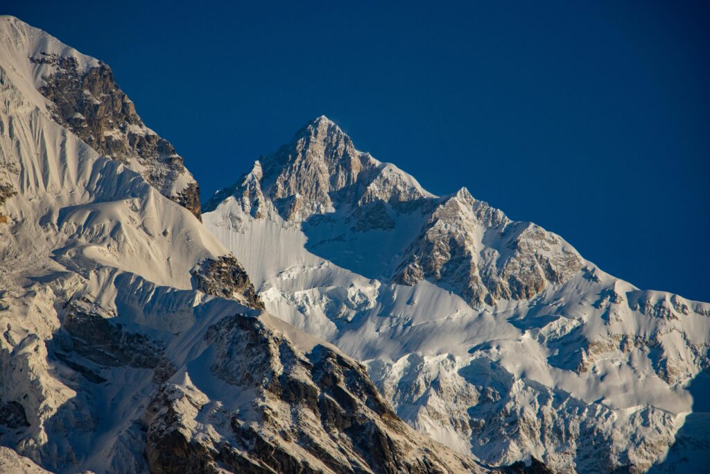 Majestic Mount Kanchenjunga in Sikkim, India image of legendary traveller travel agency background